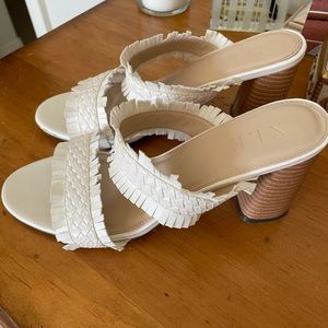 XLE white mule heels